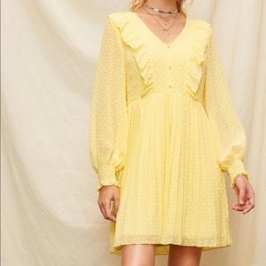 Yellow ruffle front dress
